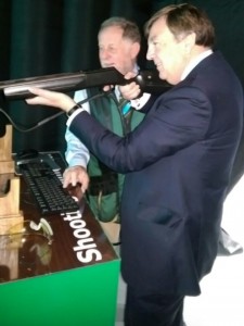 John Whittingdale MP taking the opportunity to to try his hand at shooting